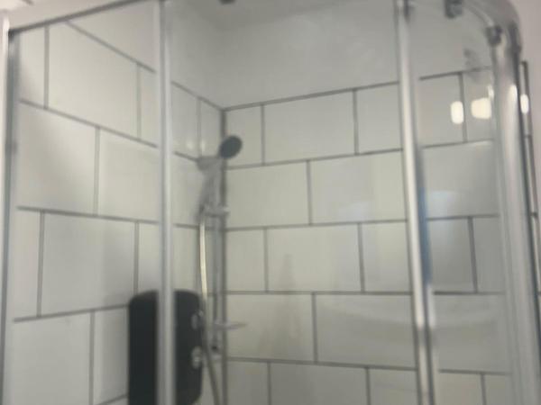 Empire trades curved shower enclosure