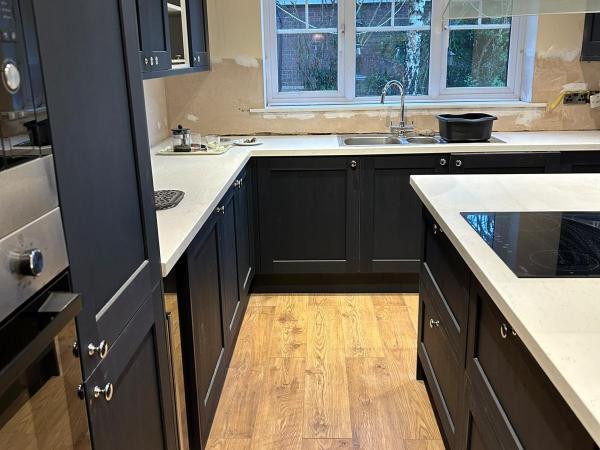 Empire trades dark kitchen cabinets