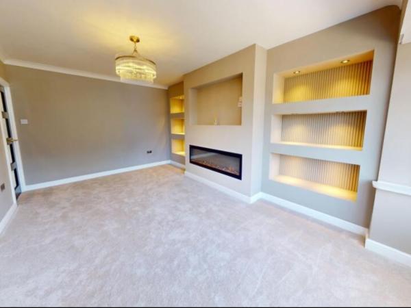Empire trades living room feature wall and shelving