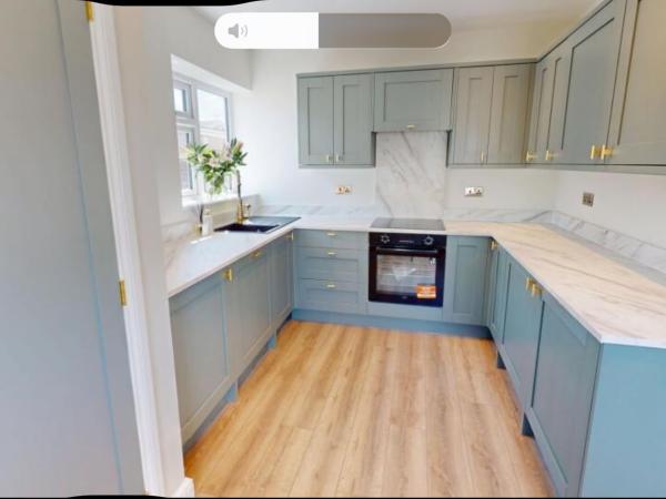 Empire trades sage green fitted kitchen